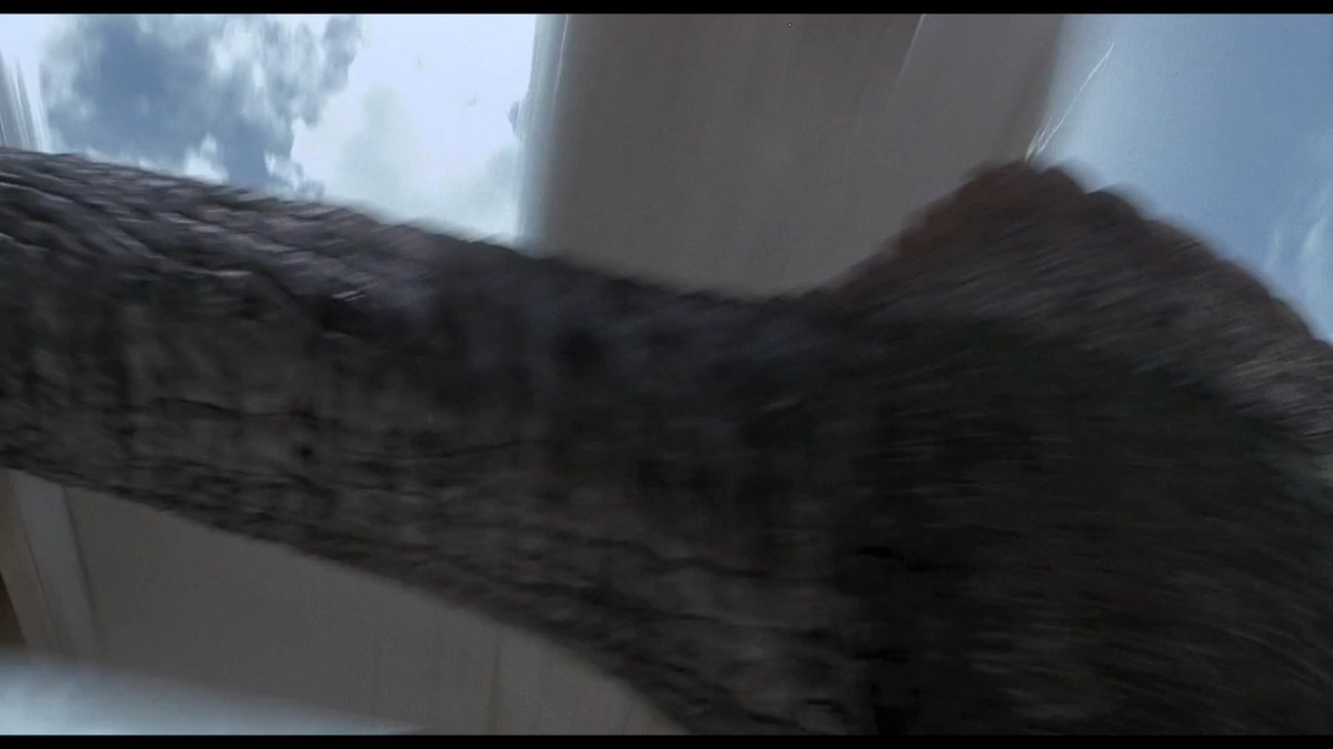 It's interesting that they chose to have the Spinosaurus reveal in broad daylight like this. They grace the fin with the plane, splashing blood up on the window.  #JurassicThreewatch