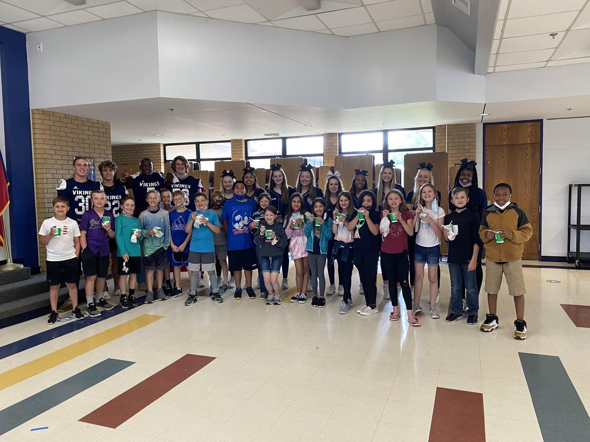 3rd &amp; 4th graders getting encouragement from our Bryan Vikings Football Team and Cheer Team in celebration of “Crushing the STAAR” with their yummy snow cones!