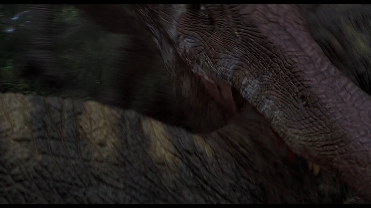 They wrestle for a bit, Spinosaurus gets free and then bites into T-Rex's neck. The switching between CGI and practical effects actually work really well here, the dinosaurs don't feel weightless like many CGI fights tend to.  #JurassicThreewatch