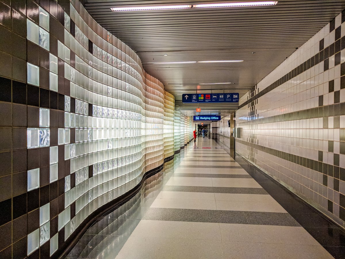 Jahn's masterful design of functional underground spaces at O'Hare famously extends to the colorful CTA Blue Line terminal (and a spiritually related but separate underground passageway elsewhere, which I can't place but which must have been Jahn's work).