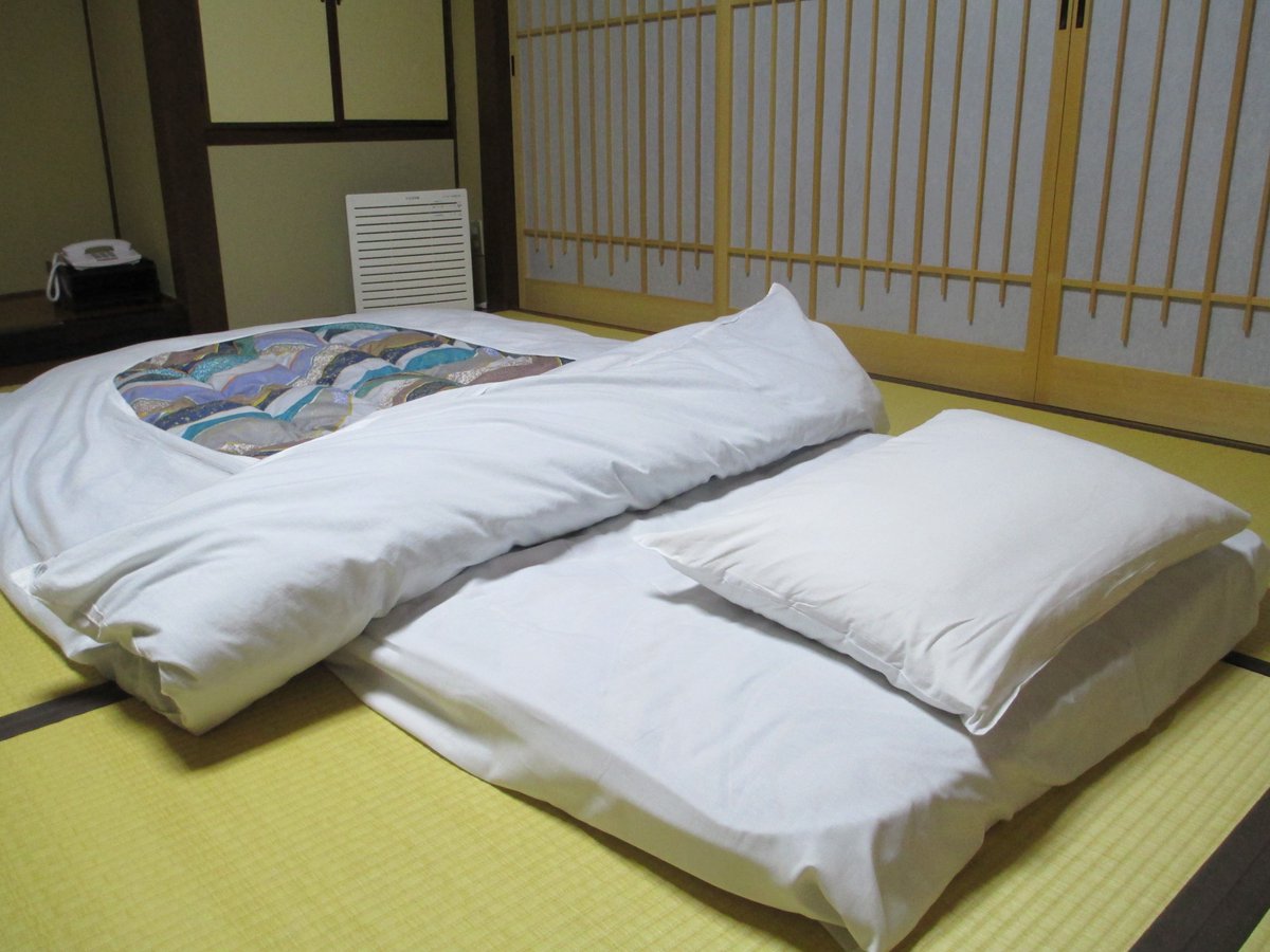iplanjapan's tweet photo. A welcome sight when you return to your ryokan after dinner - your futon has been laid out ready for a good night's sleep #Japan #onlyinjapan #Travel #TravelTuesday #hotel #ryokan #LuxuryTravel #hotels https://t.co/GBXFh7kiQ2