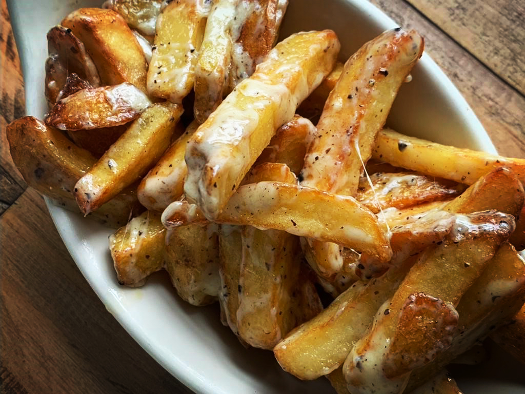 First #Tweet! What to post? #Chips obviously. One of the perks of the job is trying out our products. Made these with <a href="/Godminsterfarm/">Godminster</a> truffle cheddar and they were amazing.