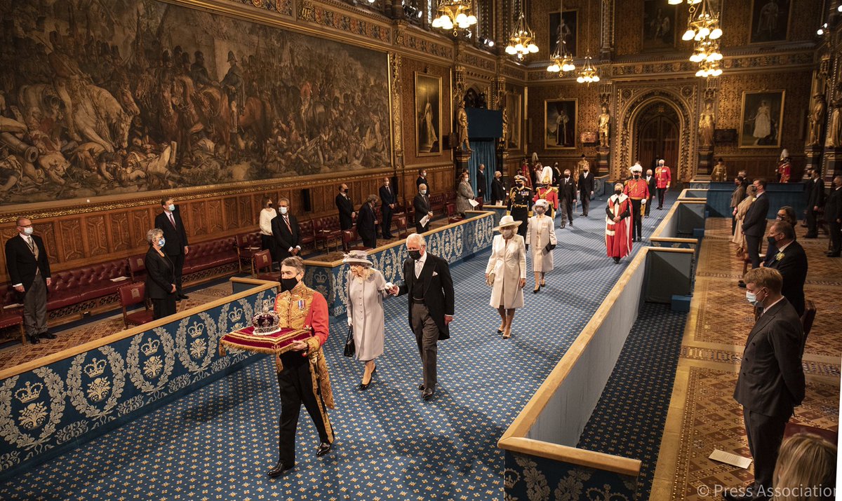 ClarenceHouse's tweet photo. Her Majesty The Queen, accompanied by The Prince of Wales and The Duchess of Cornwall, has opened a new session of Parliament. 

Find out about the history and traditions of #StateOpening over on @RoyalFamily. https://t.co/6nJcUFZ4Ak