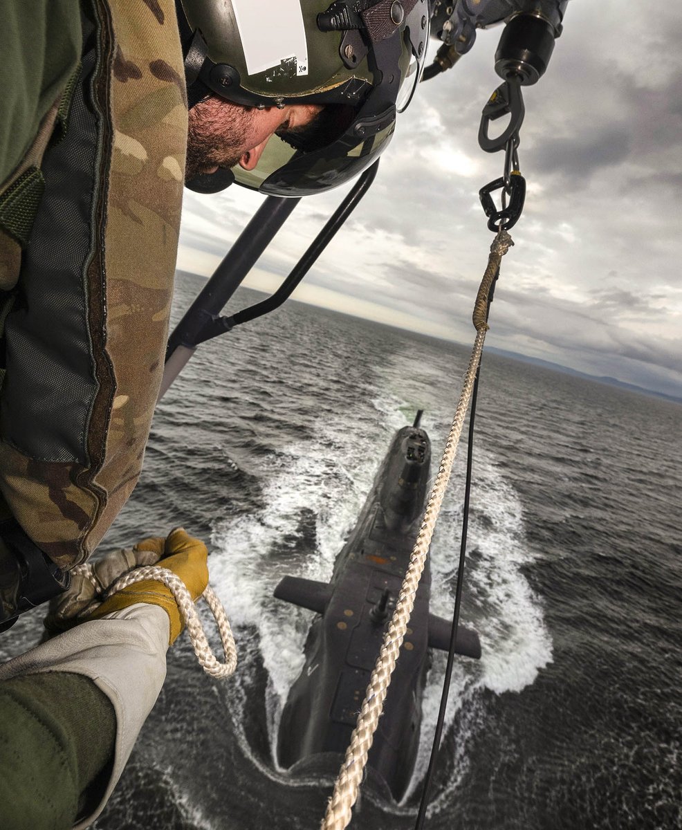 NavyLookout's tweet photo. 206 Flight Wildcat of @815NAS  @hms_kent conducts a winching exercise with HMS Artful during ex #StrikeWarrior https://t.co/mopolVtaUv