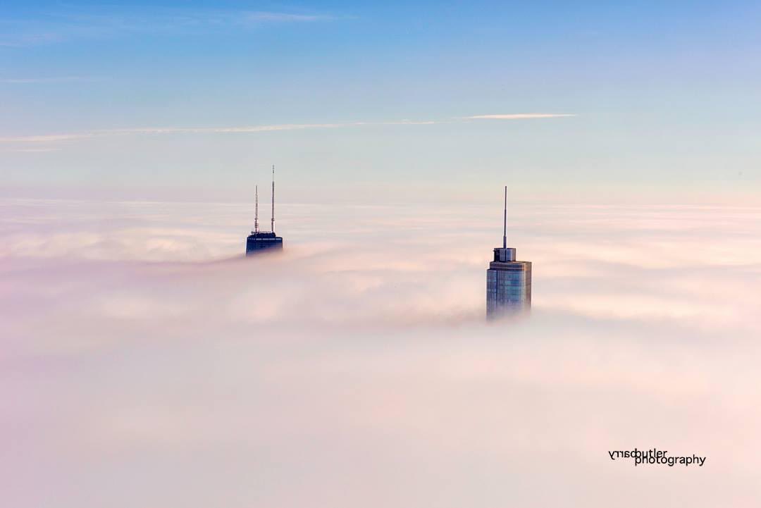 It’s Two For Tuesday.  Two Towers emerging from the fog on this day in 2016.   #chicago #weather