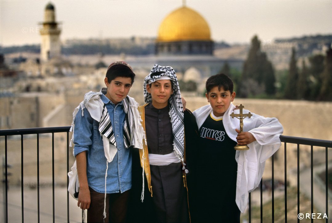 REZAphotography's tweet photo. Today is international Keffiyeh day. 
Few years ago, I took this picture of three teenage boys with three religious beliefs sharing a name : Abraham. I will forever focus on the details that unite than what divides us. 
A home is a sacred place that shall not #SaveSheikhJarrah https://t.co/IwoBLmY0n4
