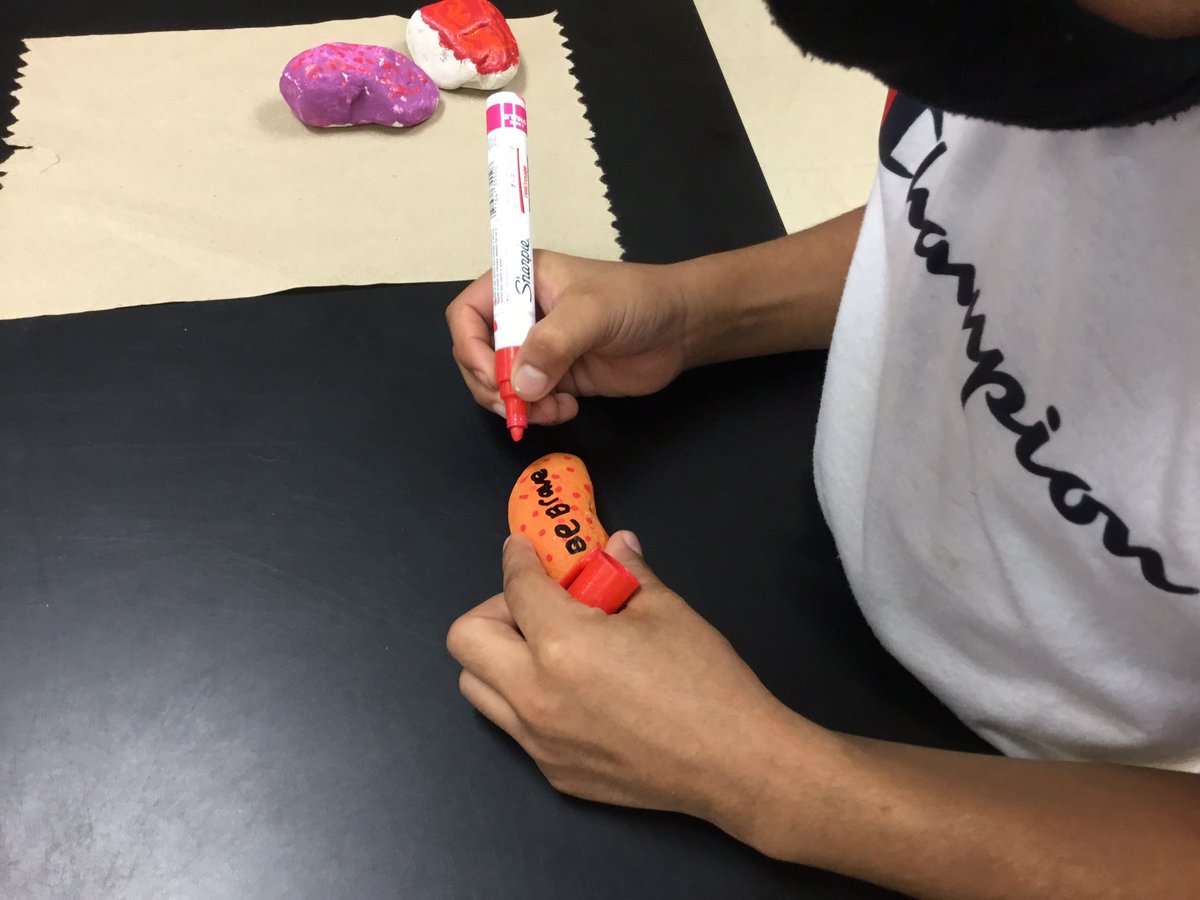 gesmakerspace's tweet image. Second graders adding kind phrases to their rocks and placing them in a heart shape in their Service Garden in hopes of lifting spirits of those who visit their Kindness Rock Garden.