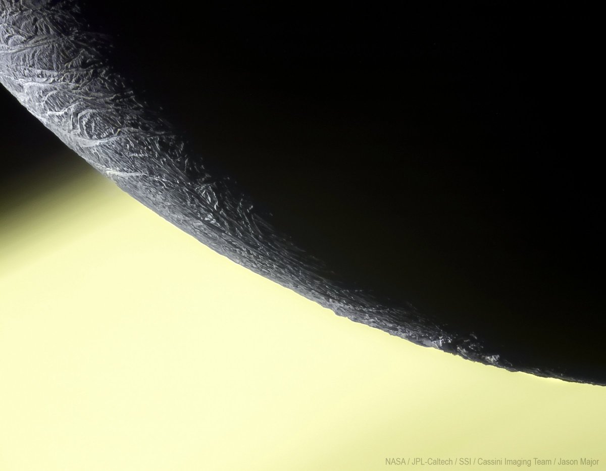 The limb of Enceladus in front of Saturn; a view captured by NASA's #Cassini spacecraft on December 19, 2015.