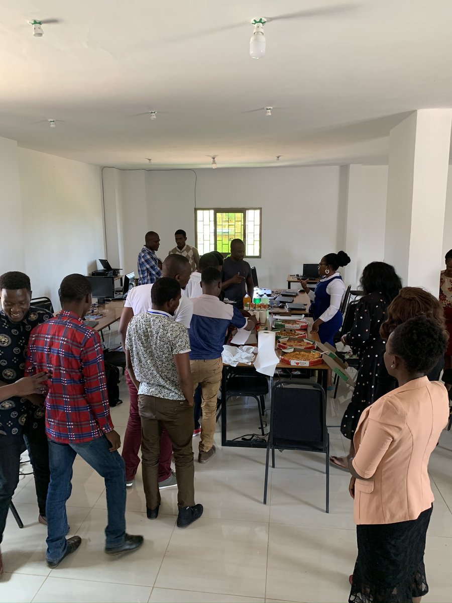 The love of pizza is universal! After a morning training session, Tiderise staff share lunch.