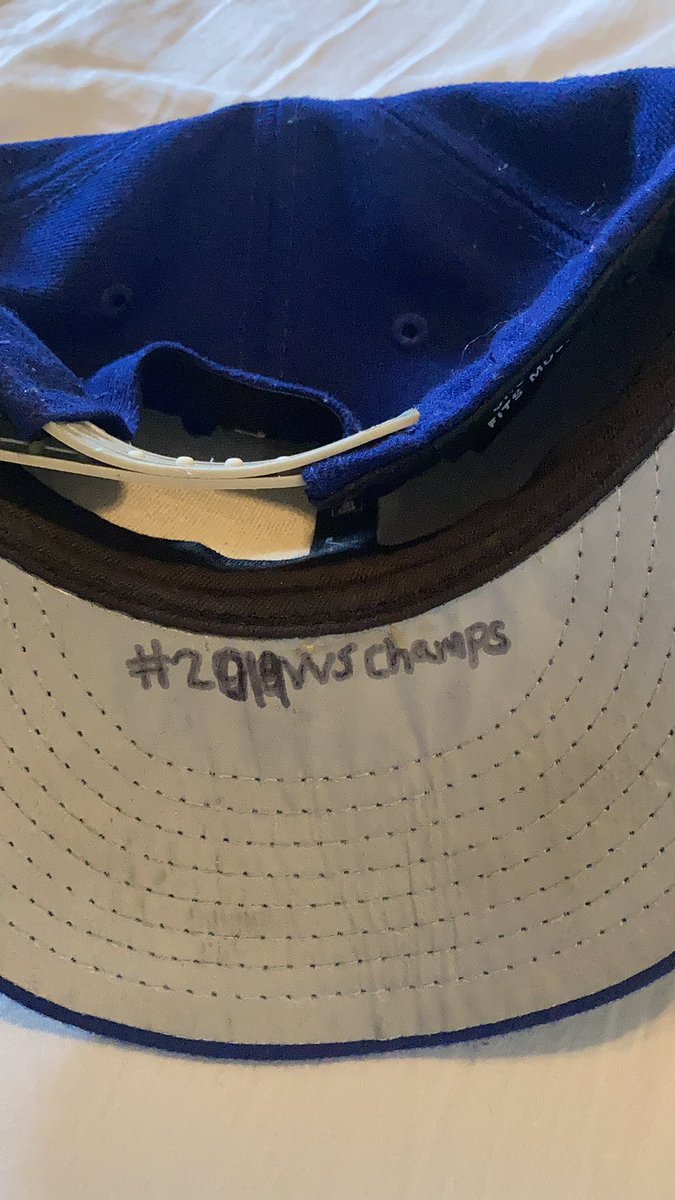 JustAKidFromPR's tweet photo. Just found this Dodgers hat as I’m packing up to move. I was so down after losing in 2017 that I wrote #2018WSChamps on it the day after we lost. Lost in 2018 and wrote #2019WSChamps over it. Thank god I didn’t write #2020WSChamps maybe we would’ve lost 😂 https://t.co/27S9Ct0I01