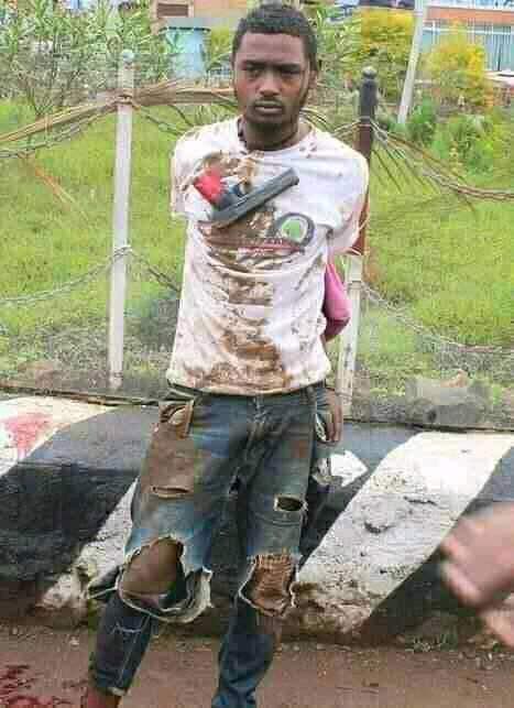 awolallo's tweet photo. This is Amanuel Wandimu, executed yesterday by Ethiopian forces in cold blood, without any remorse, in front of spectators, in the city center, in Dembi Dollo, Western Ethiopia. 

We are witnessing the return of public executions as political tools in Ethiopia https://t.co/RlwXeuuDxS
