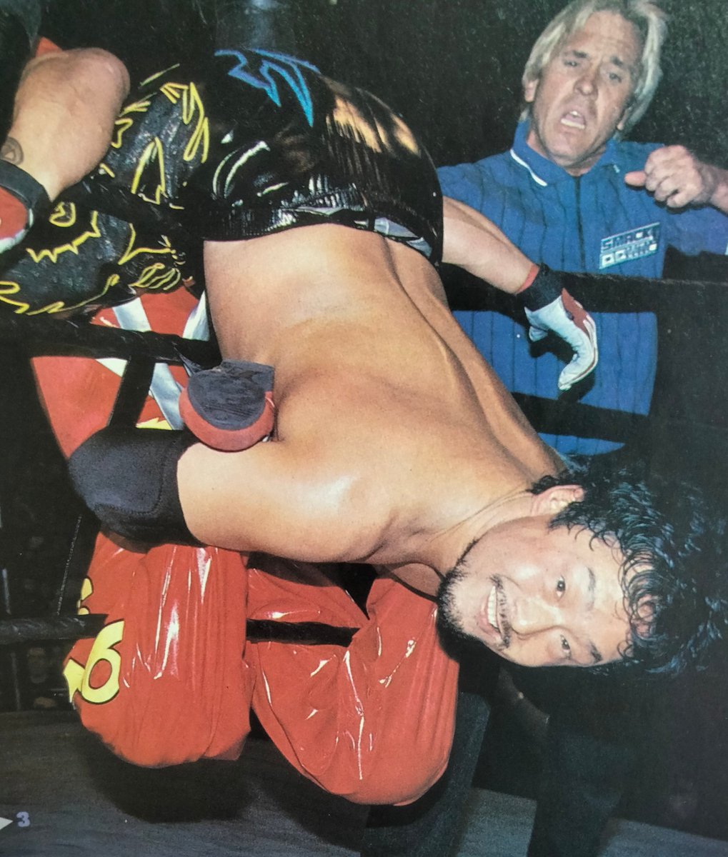 Rasslin' History 101's tweet - "Tajiri ignores the warning from referee Charles Robinson to get his close-up from the camera as he has the Tarantula applied to Rey Mysterio during the Cruiserweight