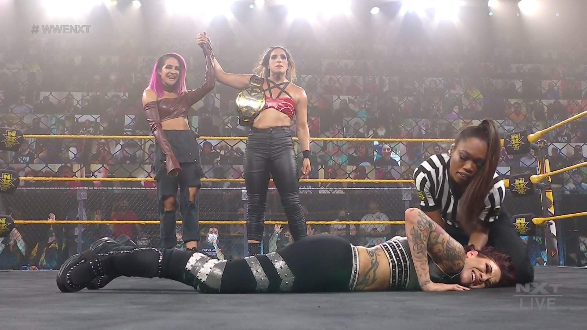 Dakota Kai (L) stands with Raquel Gonzalez after her NXT women's title win. (WWE)