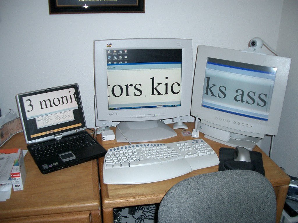 shanselman's tweet photo. I wrote a blog post on December 22, 2003 where I talked about how nice it was to have three monitors. Every few weeks the picture - now owned apparently by the internet - goes viral. Here’s the original. Enjoy. https://t.co/3pEmxR5xVy