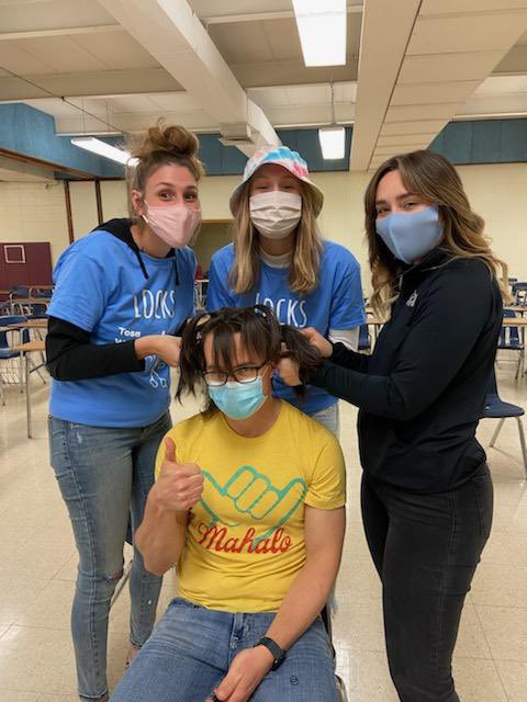 thetosacompass's tweet photo. 4 teachers and 16 students each donated at least 8 inches of hair through the 13th annual Locks of Love event at Wauwatosa West on April 30, 2021. The hair collected goes to an organization called Children with Hair Loss, who makes wigs and gives them to children free of charge. https://t.co/qPX77kySW5