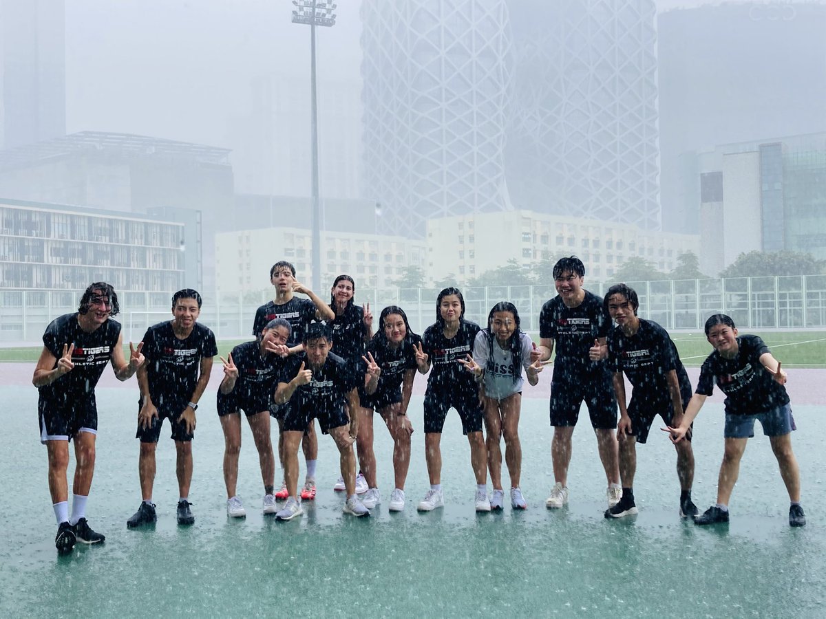 DanyjPE's tweet photo. Rain?! What rain? 😂☔️ Grade 10 students making the most of PE class during an unexpected downpour. The smiles say it all 😁. #BePositive #resilience #TISMacao https://t.co/u4ymWNBVUA