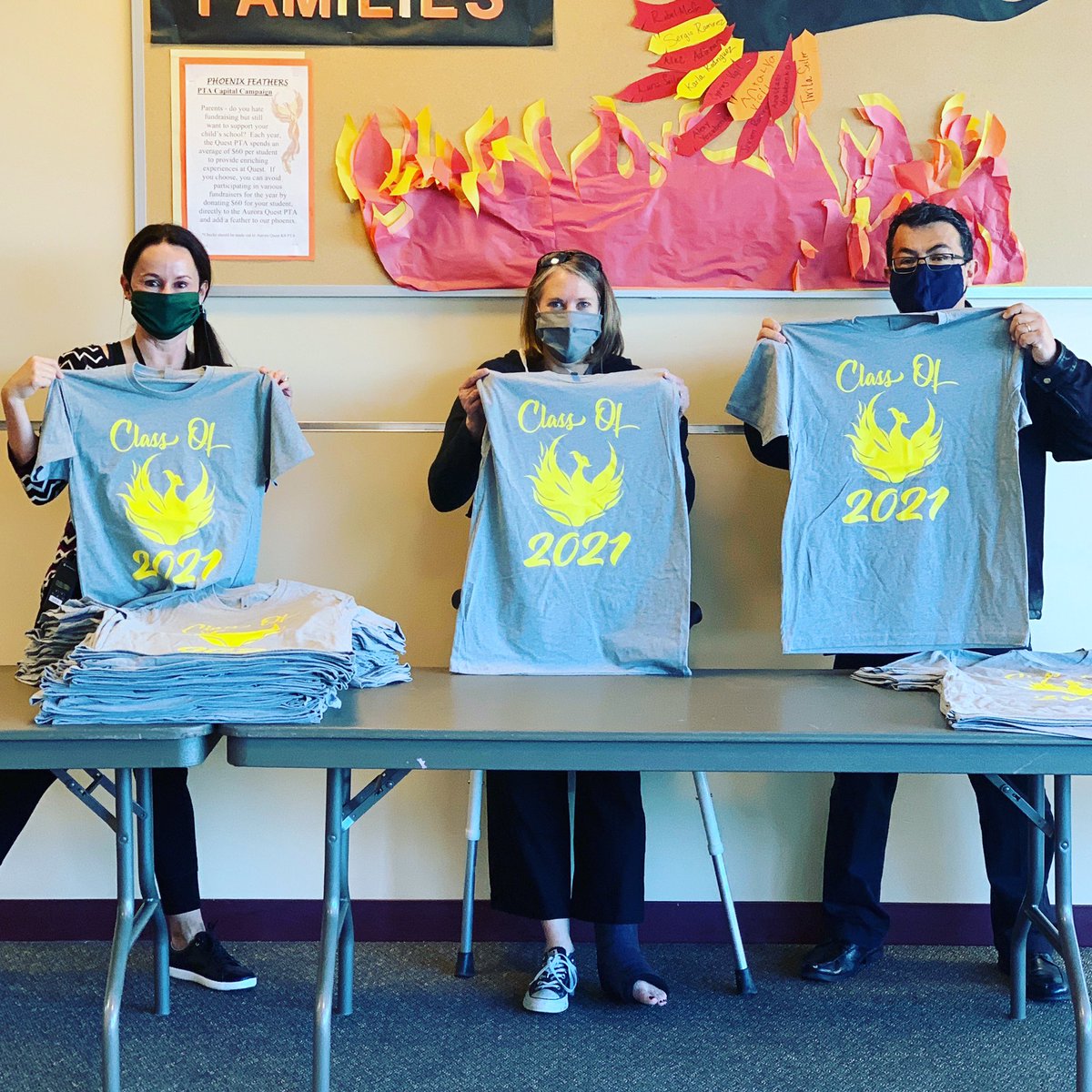 Passing out our 8th-grade t-shirts!