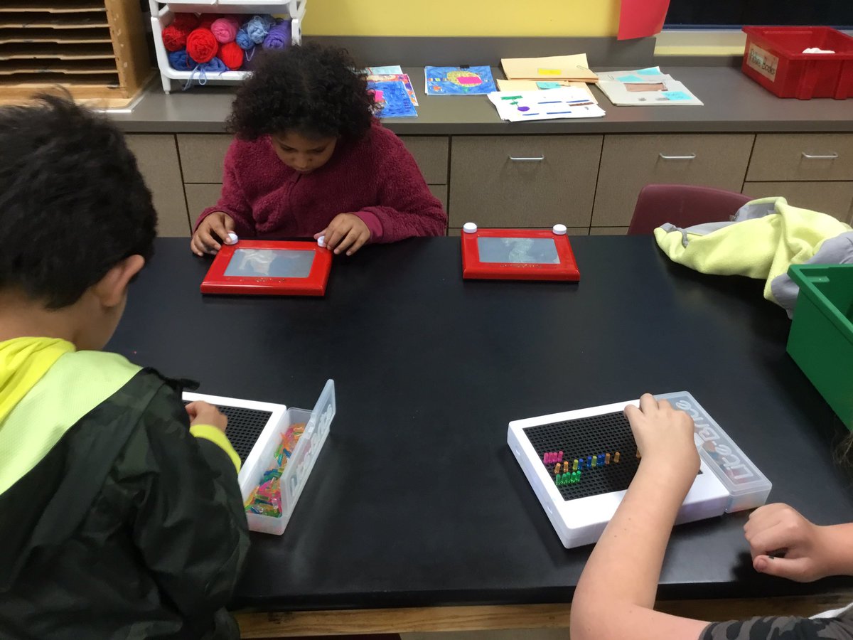 gesmakerspace's tweet image. Fourth graders rotate through interactive centers.