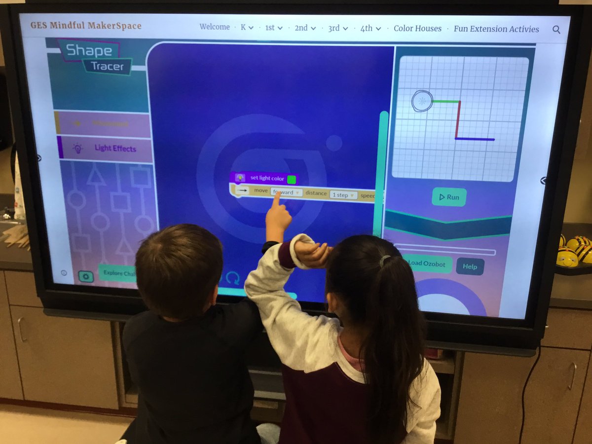gesmakerspace's tweet image. First graders rotate through interactive centers.