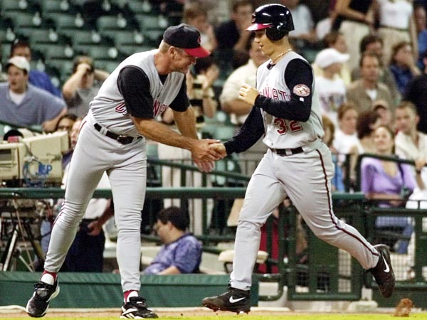 TheStevenSharp's tweet image. … In the top of the eleventh inning, on back-to-back home runs, the Reds scored four runs.  #Reds second baseman Pokey Reese (pictured, left) hit a three-run home run.  Relief pitcher @dgravy32 (pictured with Reds third base coach Ron Oester, right) hit a home run.  … (3 of 5)