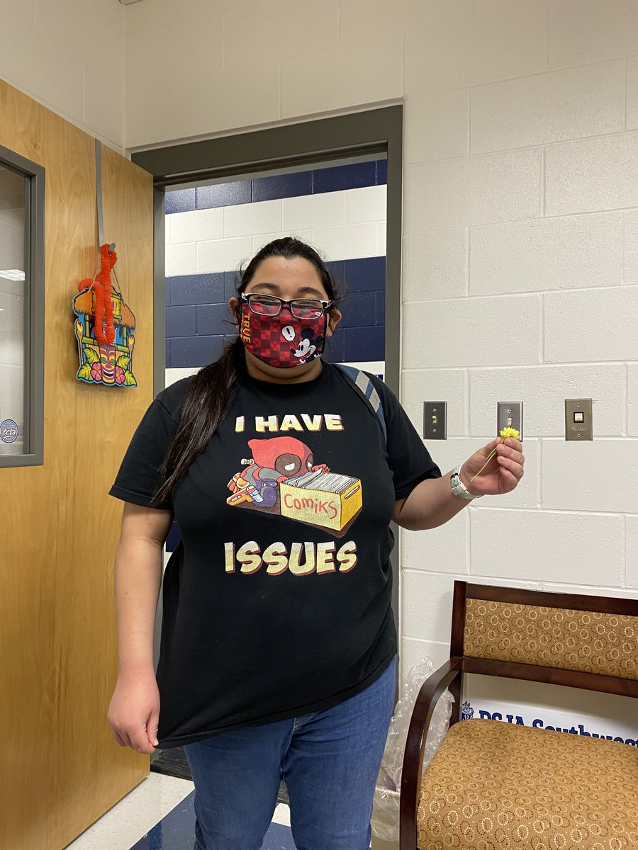 Thank you, Alicia! My sweet senior Book Hogger brightened my day with a yellow flower for me. She wears the coolest T-shirts all the time. #librarianlife #PSJAReads