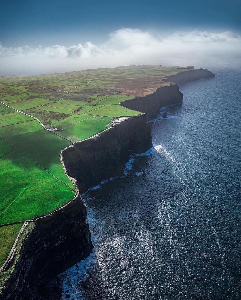 earth's tweet image. The Cliffs of Moher, Ireland.