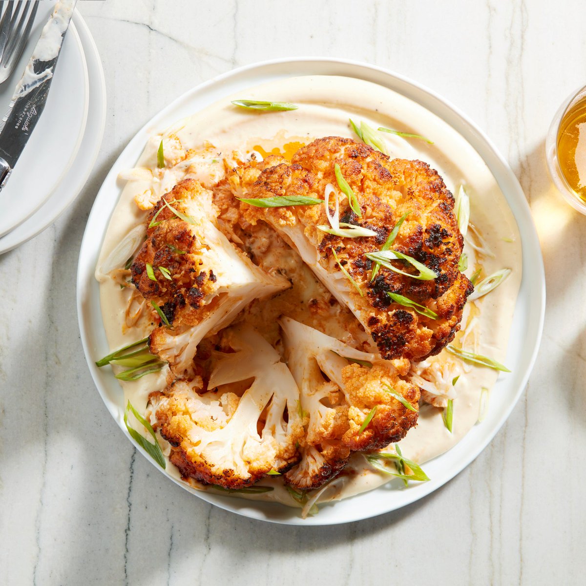 epicurious's tweet photo. This Grilled Whole Cauliflower with Miso Mayo makes a great vegetarian entrée and goes nicely with your favorite grill mains and sides. https://t.co/n3cDNO2g52 https://t.co/a0D7j8YNcb
