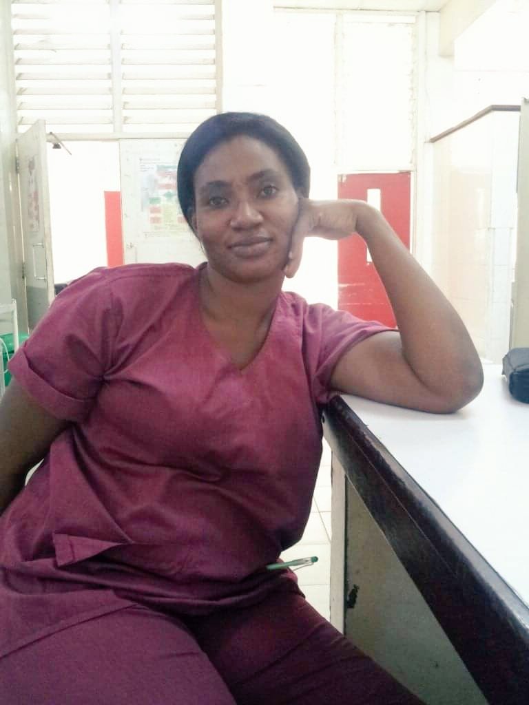An RN midwife with over 10yrs of experience in the field. A mother of 3 blessing managed to raise 3 children, work two jobs and In 2018 she bagged a bachelors degree in nursing in UTG . We salute you and we appreciate you Blessing Chigbu. Happy #NursesWeek2021
#WeAnswerTheCall