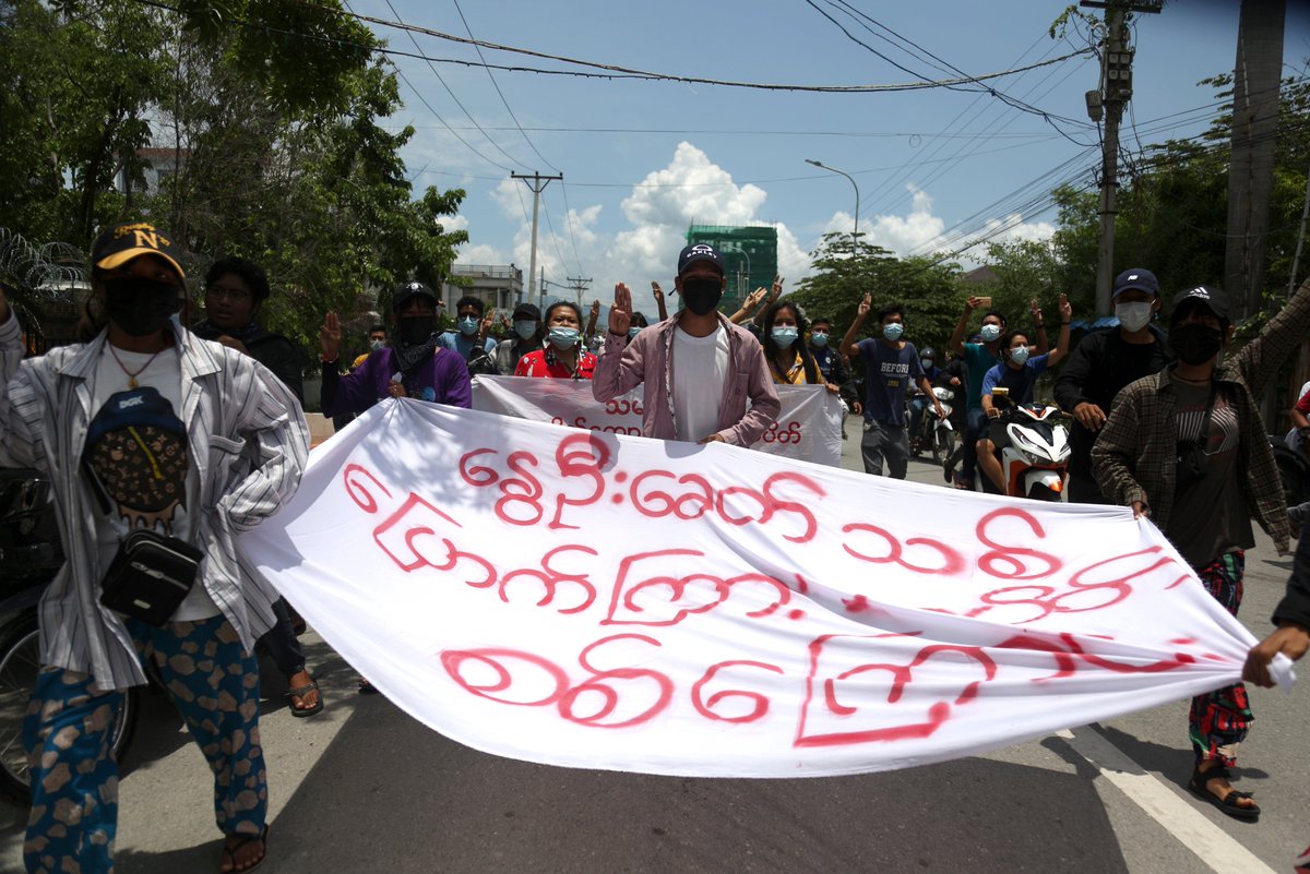 #Myanmar demonstrators shout slogans as they march on a street during an anti-military coup protest in #Mandalay, Myanmar, 13 May 2021. EFE-EPA