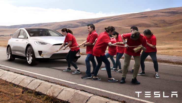 TheOnion's tweet photo. Elon Musk Unveils New Clean Energy Luxury Car Pulled By 8 Tesla Employees https://t.co/uJOGZ3Fnnf https://t.co/WgzBMS7esz