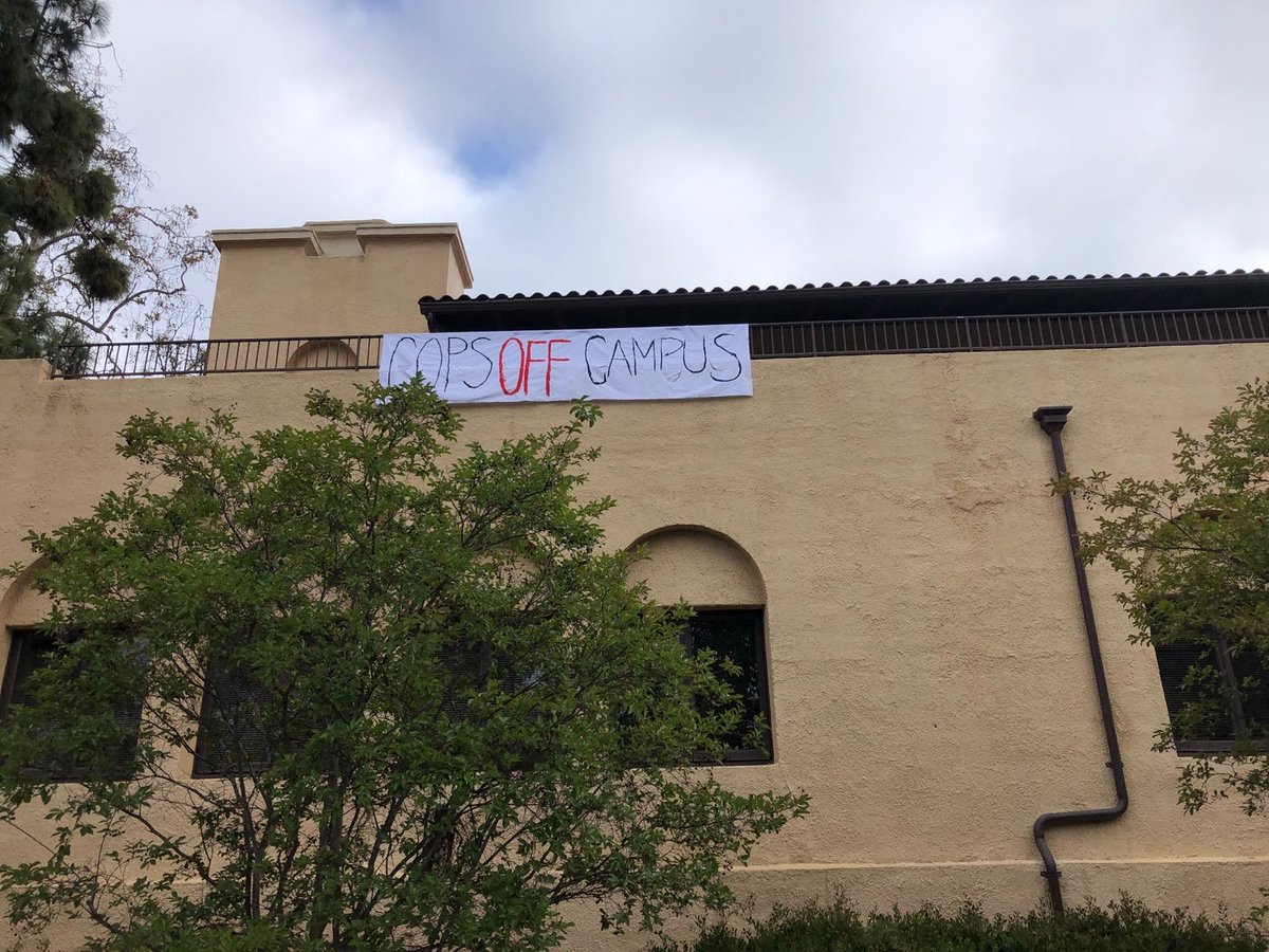 abolishstanford's tweet photo. This morning, Abolish Stanford dropped two banners, reading “Cops Off Campus” and “Cops Off Earth” from The Birdcage as part of Abolition May. These are our demands—nothing less. https://t.co/fSbdO5lZGL