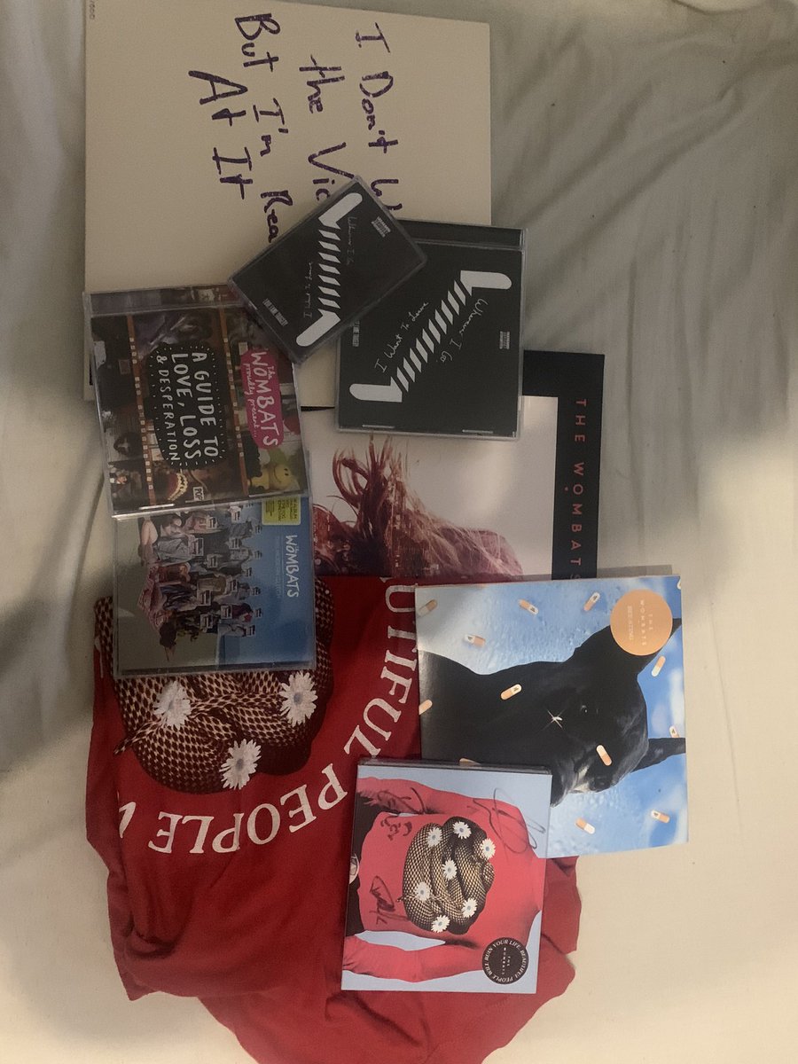 ChowardReal's tweet photo. @thewombats @thewombats #wombatscomp a few wombats and @lovefametragedy items in my room :) tickets, poster, albums and merch https://t.co/y8PlsqneKF
