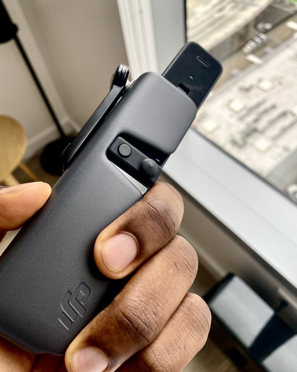 ayoola's tweet photo. dear @DJIGlobal, I just purchased your Pocket 2 handheld camera. As a camera, this little device is great. 

The issue I have is it looks like a GUN. 

As a black man living in America, I cannot afford to carry a pocket camera that resembles a gun. Please consider redesigning 😞 https://t.co/db2wPTIr7Q