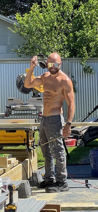 Passerby’s snapping candid shots of me building a deck! At least he sent me the pix! Lol 😂 https://t