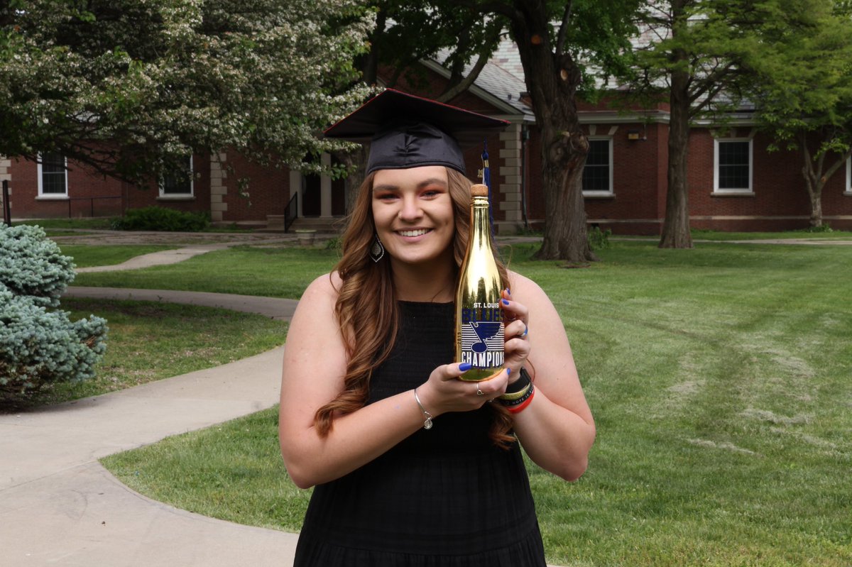 imabrick_WALL's tweet photo. @StLouisBlues Graduating nursing school seemed to be the best occasion to pop a bottle of the Stanley Cup champagne 🍾🎓🔵🟡🏒 https://t.co/pYAwed6H1J