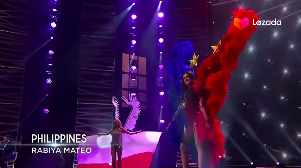 rapplerdotcom's tweet photo. @MissUniverse Here comes Miss Philippines Rabiya Mateo in her national costume inspired by the Philippine flag! 🇵🇭  #AribaRabiya #MissUniverse #MissUniverse2020 

📸 (Youtube/LazadaPH) https://t.co/vSW8MAmaIM