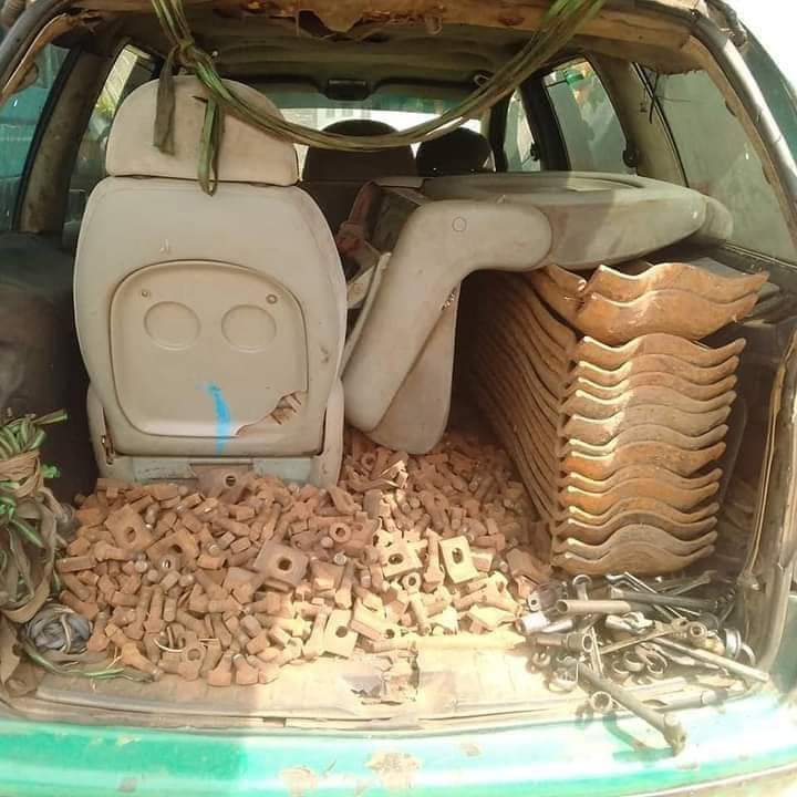 Atulefa's tweet image. The newly refurbished Warri /Itakpe rail tracks been vandalized by these dudes. Are we humans in this zoo called Nigeria?