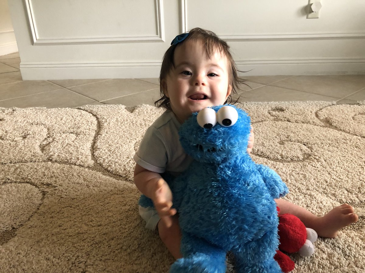 Our daughter Natalie, who has #DownSyndrome, aced today’s therapy session &amp; celebrated with her pal <a href="/MeCookieMonster/">Cookie Monster</a>. She’s a tough cookie! <a href="/sesamestreet/">Sesame Street</a>
