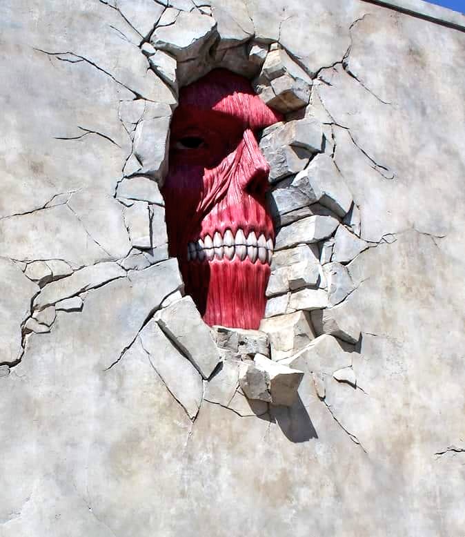 Зеленые загадки. Руки торчащие из потолка. Торчит из стены. Из стены торчу головой кручу мою и пою целую семью отгадка. Московский бэнкси уличный художник.