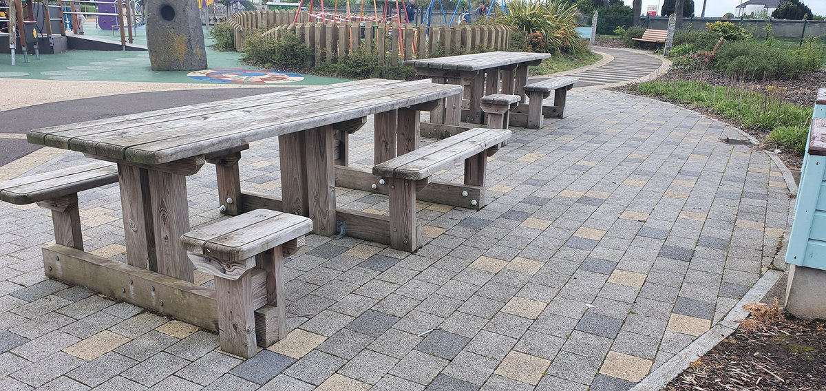 Two wheelchair accessible picnic tables