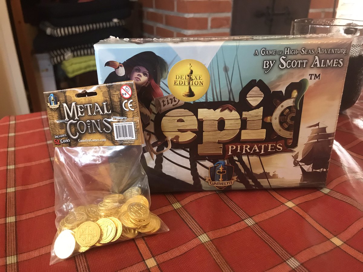 Settling down for some Tiny Epic Pirates by <a href="/Gamelyn_Games/">Gamelyn Games</a> .  Metal coins, neoprene mats and a lot timbers to be shivered, Arrrrrr!