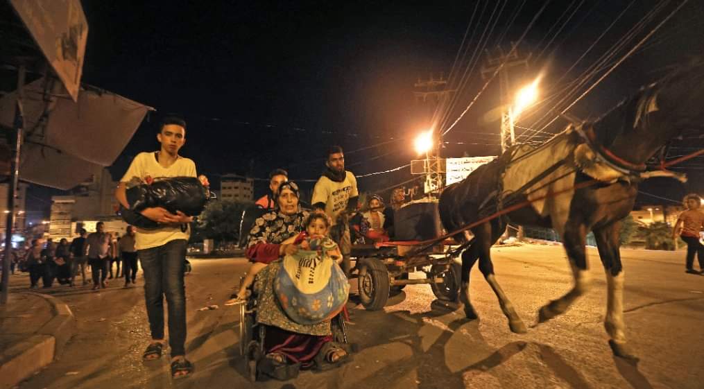 makkawea's tweet photo. Israeli artillery and tank shells fired into Gaza forced many Palestinian families to flee their homes — 
#GazzaUnderAttack 
#FreePalestine https://t.co/6j8vXet0Y5