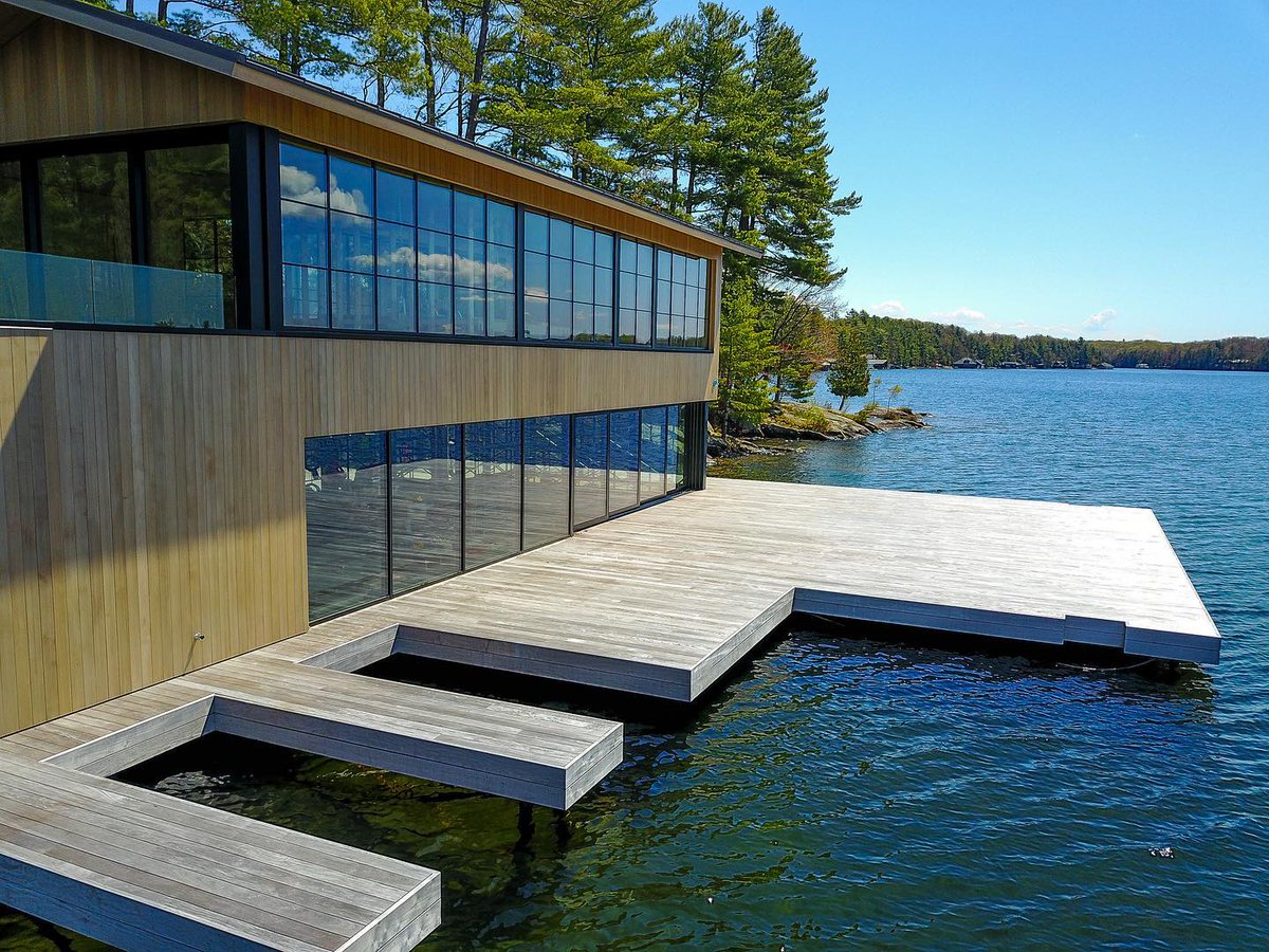 SapphireRoofing's tweet photo. The black aluminum trim is the perfect accent for the extravagant windows on this house and boathouse.

Want to know more about ACM?

Visit our website 
https://t.co/KZK8Bijv4o

#barrie #muskoka #collingwood  #roofing #roofer  #roofingseason #acmpanels #siding #metalsiding #lake https://t.co/2tfSplAu48