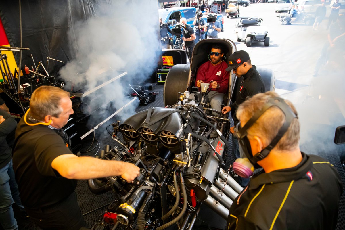 ToyotaRacingUSA's tweet photo. When #NASCAR meets #NHRA! warmups, burnouts and #Supra races! #TeamToyota https://t.co/7YFN36Av1S