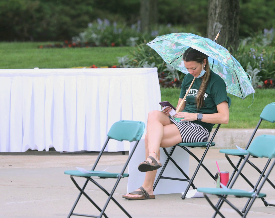 washtenawcc's tweet photo. A few light sprinkles won't scare away our faculty and staff who are on campus, waiting to celebrate our 2021 and 2020 graduates at the Commencement Parade &amp; Celebration!

#WCCGrad #WCCProud https://t.co/DarfVaNDWv
