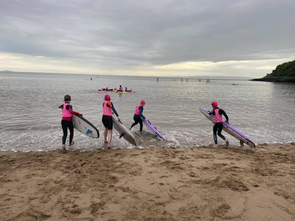 ValeSLSC's tweet photo. The sea may still be cold but that doesn’t stop the Vale nippers! 🌊🏄🏻♀️💗🖤#futurelifeguards #Nippers #TeamVale #JBay @SLSAWales @RLSSUK @Barry_TC @Barrybados https://t.co/HoWAkgKpz6