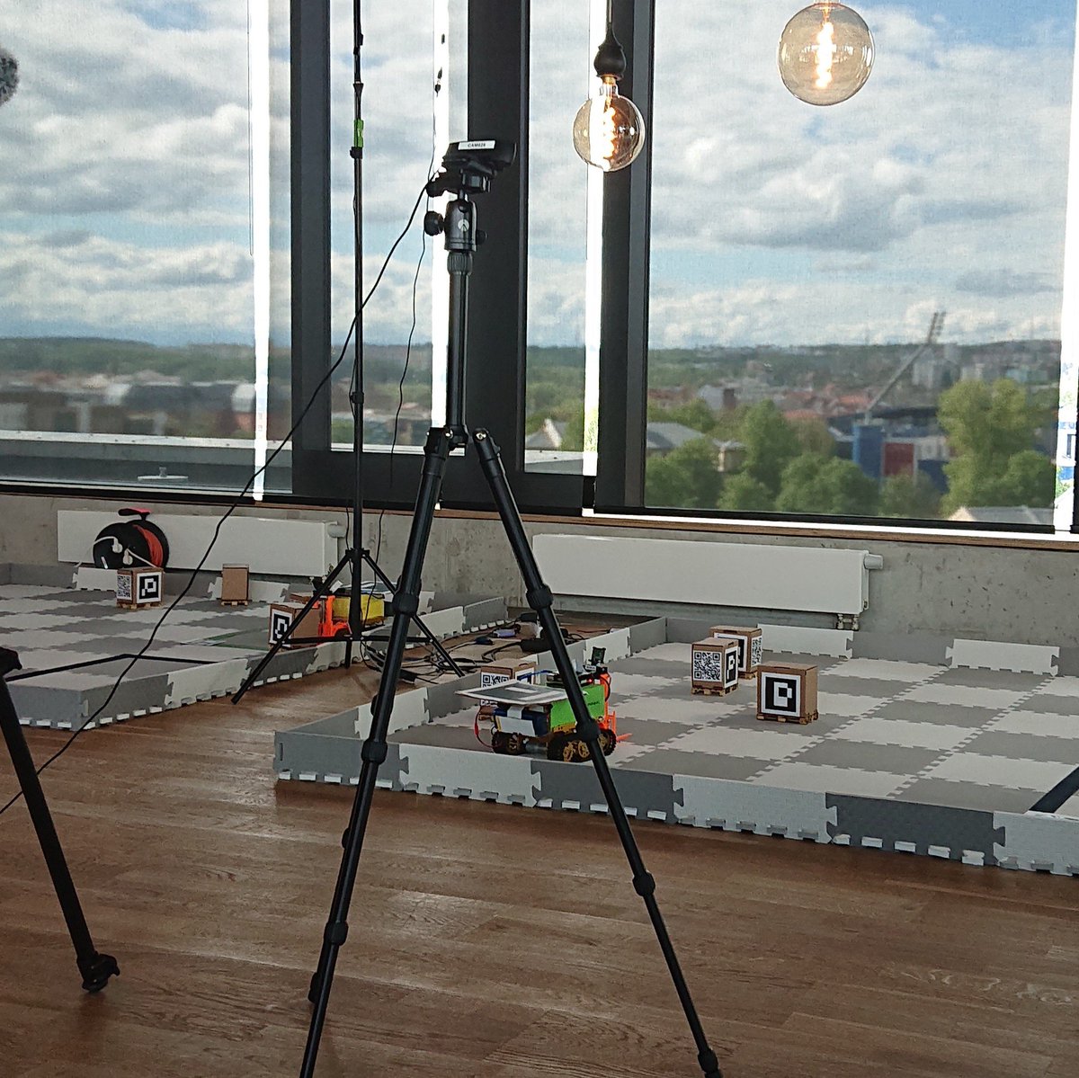 pbrada's tweet photo. Final presentations at #AimtecHackathon, great (sometimes suspenseful!) to watch the dance of the warehouse robots :) programmed by student teams. https://t.co/KIn3aF6X20