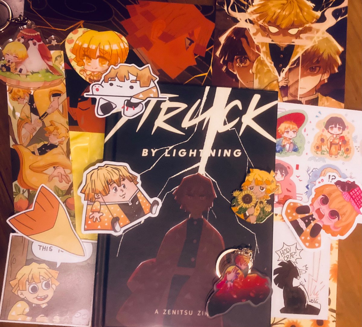 aisudoki's tweet photo. AHHH @LightningZine  FINALLY ARRIVED Q O Q 
also have a bongozen!
also 20% off leftover sales happening rn

#kny #zenitsu https://t.co/HdoMfZPzAu