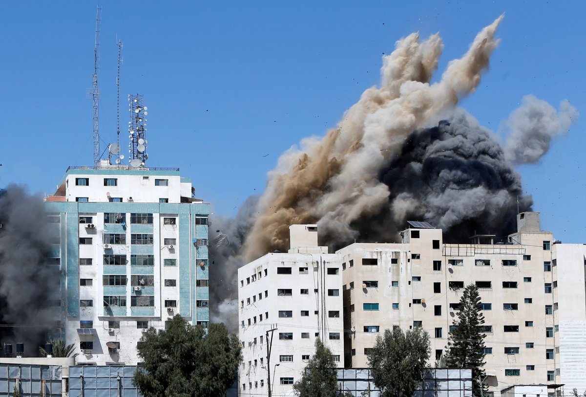 TRTWorldNow's tweet photo. @TRTArabi In pictures: Israeli air strike destroys Jala Tower in besieged Gaza housing Qatar-based Al Jazeera television and American news agency The Associated Press https://t.co/34S5wIj40U