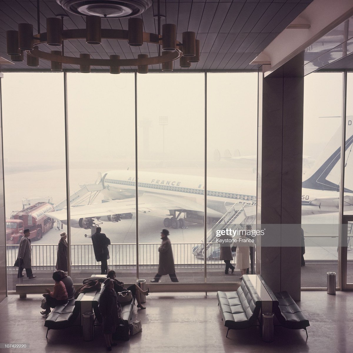 Passengers Waiting For Boarding At Orly Airport In Paris On 1960 via <a href="/GettyImages/">Getty Images</a>